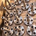 Long weld neck flanges with extended straight necks and drilled bases