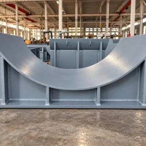 Fabricated pipe saddle support with a curved seat, base and stiffeners